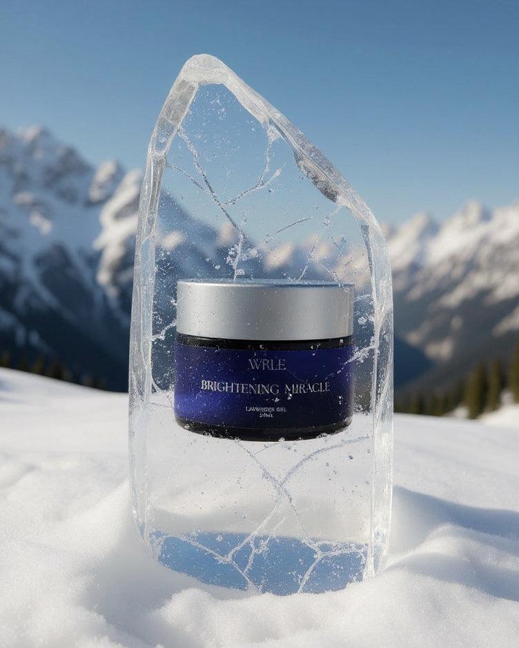 Blue jar with a silver lid on a transparent crystal block against a snowy mountain background